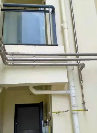 Stainless steel gas piping lines installed in a building construction project
