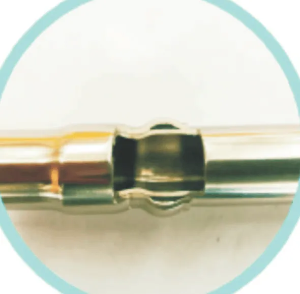 Final cross-section of a completed Orbital Press connection, showing the deep, uniform groove crimped into the pipe and fitting, and the deformed sealing ring completely filling the compressed cavity.