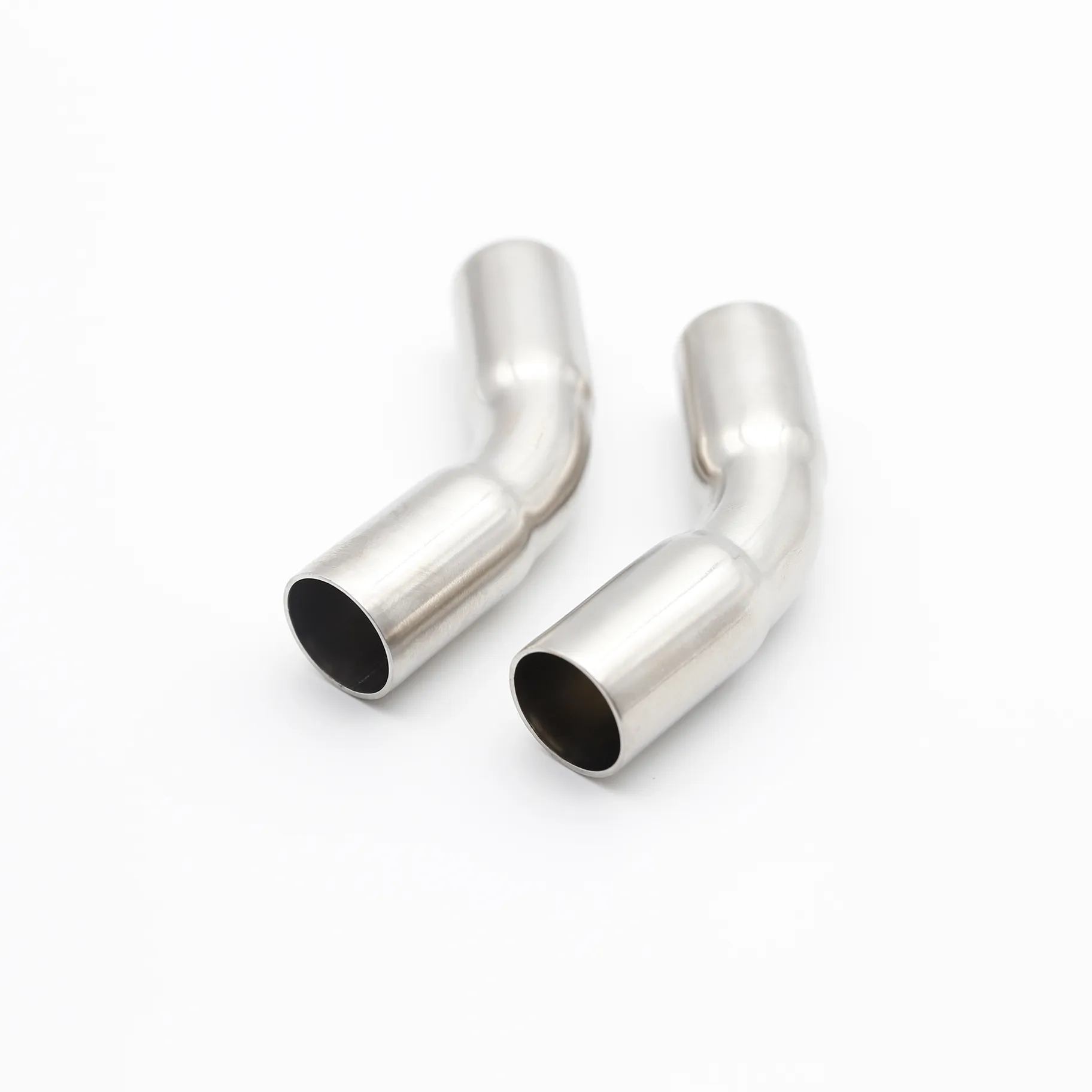 Two 45-degree elbows positioned at complementary angles, offering a three-dimensional understanding of their form.