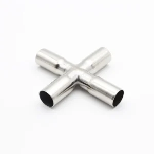 Three-quarter angle view of a stainless steel four-way equal cross fitting isolated on a white background, clearly showing all four perpendicular ports.