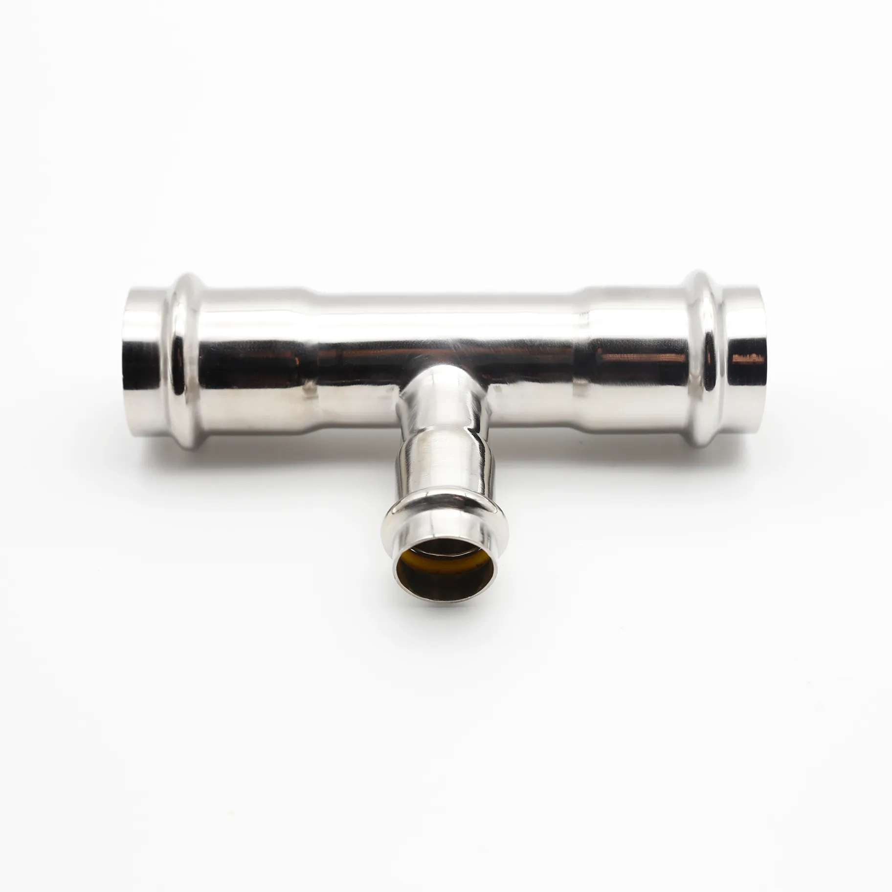 Close-up view looking directly into the smaller diameter branch outlet of the tee.