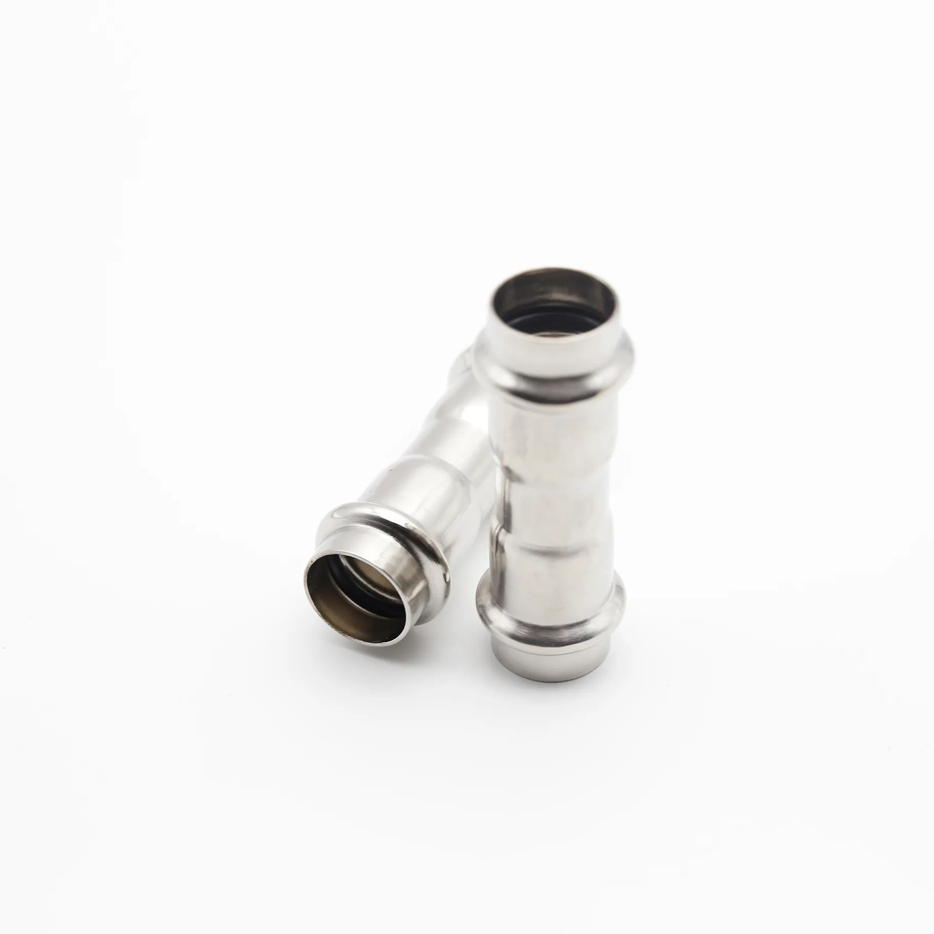 Two identical stainless steel straight couplings placed side-by-side on a white background.