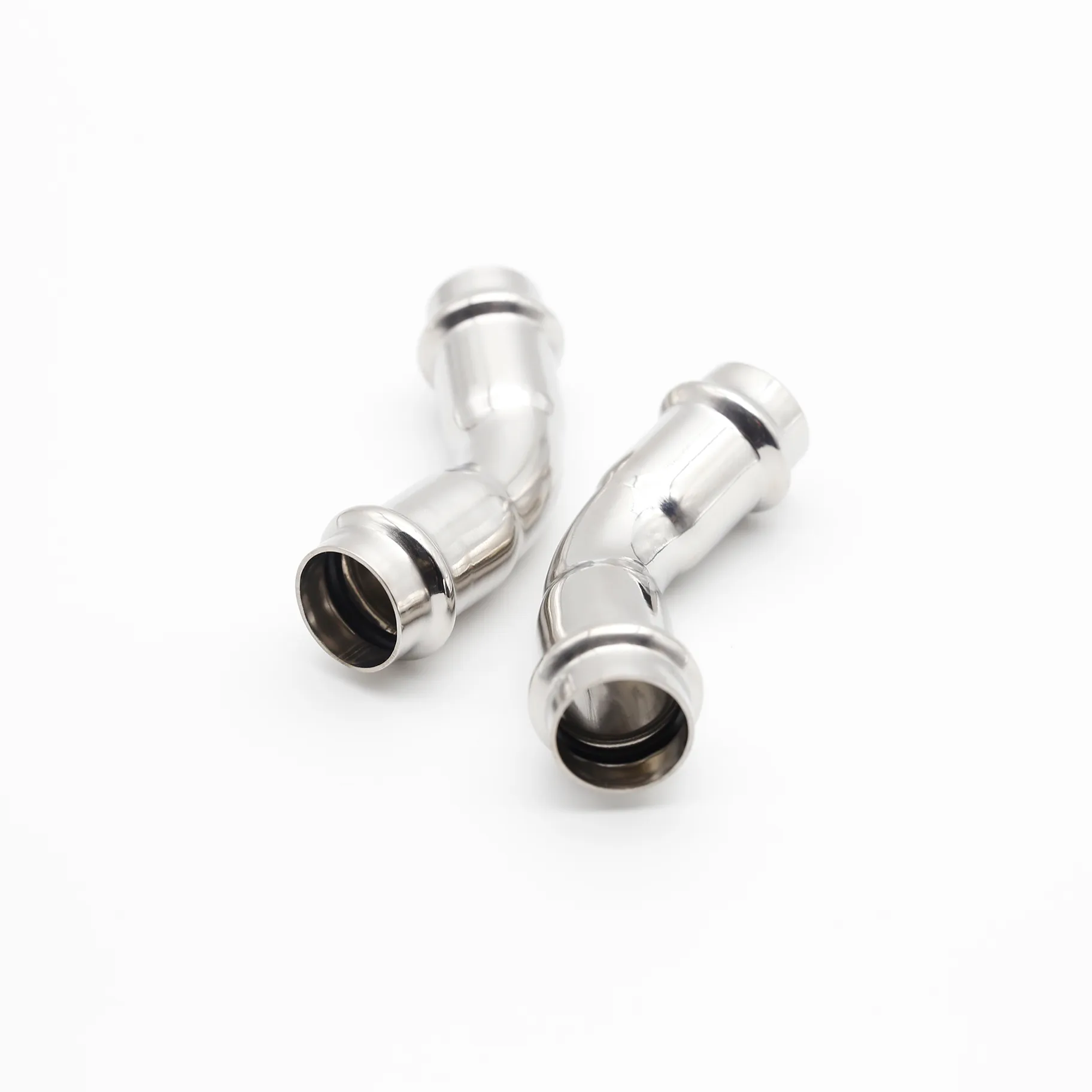 Two identical stainless steel 45-degree elbows placed side-by-side on a white background.