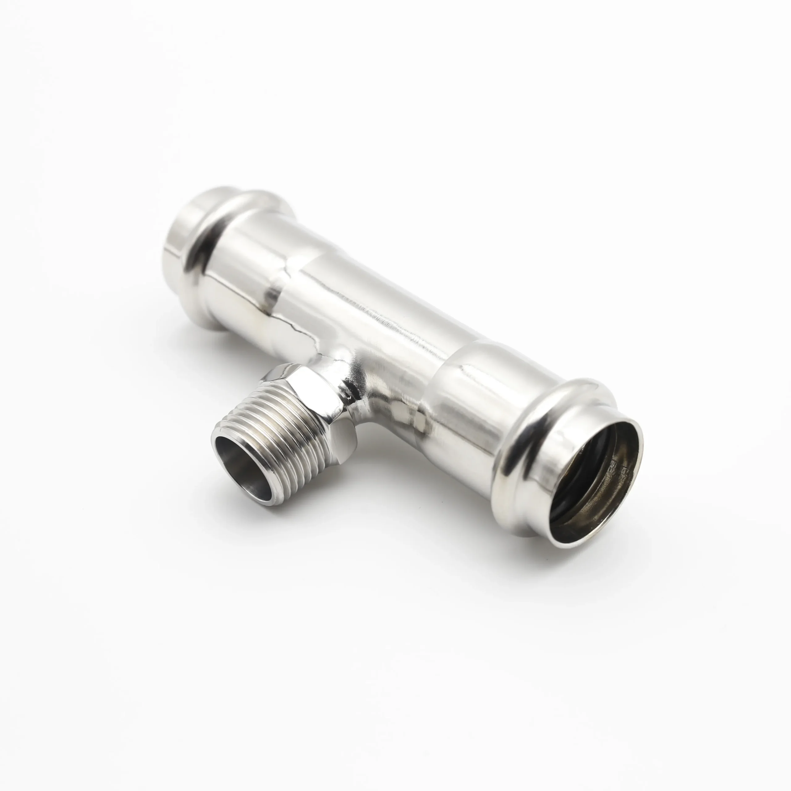 Male reducing threaded tee for stainless steel piping systems